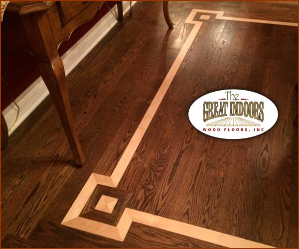 wood inlay into a hardwood floor creating an interesting border in an Indianapolis home