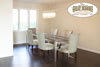 Brazilian cherry stained dark in a brightly lit dining room