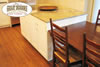 Eat in kitchen with oak flooring