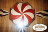 wood mosaic spiral set in a wood floor